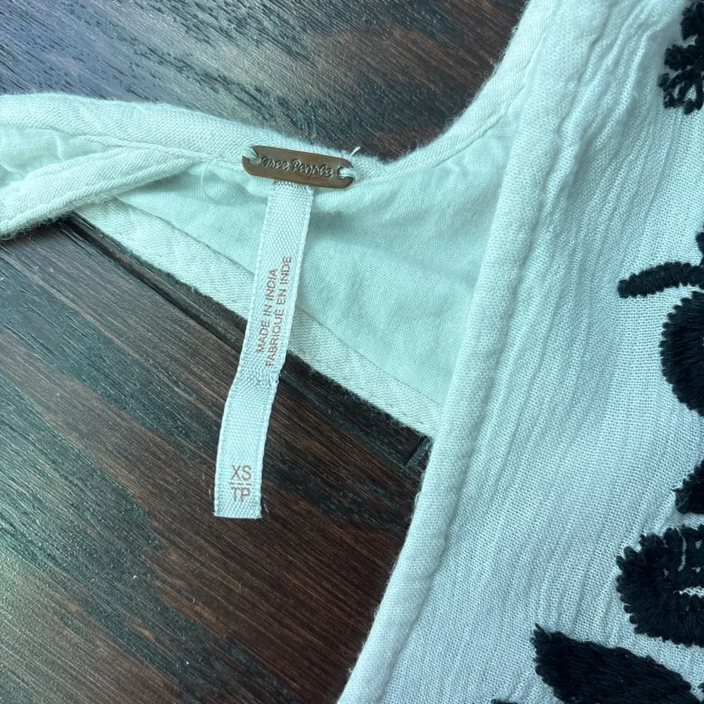 Free People “Sweet Tennessee” White Dress with Black Flower Embroidery